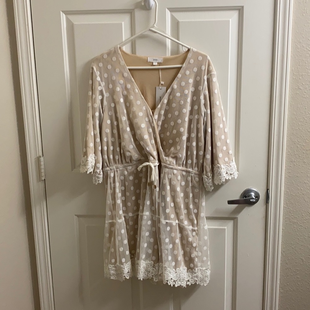 White polka dot Vicidolls romper.